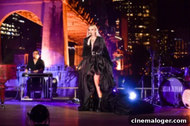 Carrie Underwood Slays AMAs With A Jaw-Dropping Plunging Black Ruffled Gown 2 carrie underwood amas 2021