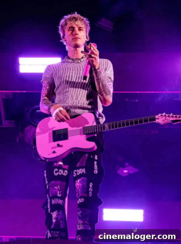 Machine Gun Kelly Rages at Grammys Over Album Snub 2 Machine Gun Kelly performing, a close-up photo