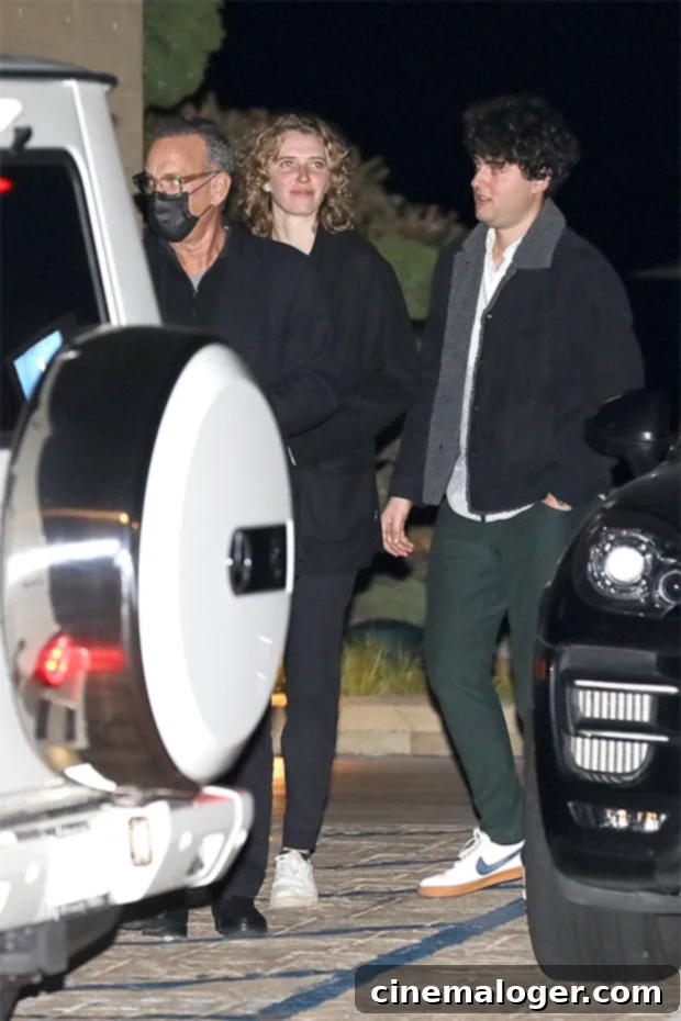 Tom Hanks, Rita Wilson & Son Truman Enjoy Rare Family Dinner 2 Tom Hanks, in the mask, leaves Nobu in Malibu. His son, Truman, right, joined him for dinner.