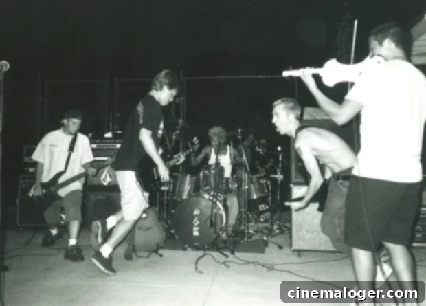 Yellowcard Electrifies Star Struck With A Heightened Punk Rock Punch 2 Yellowcard band members looking intently at something off-camera.