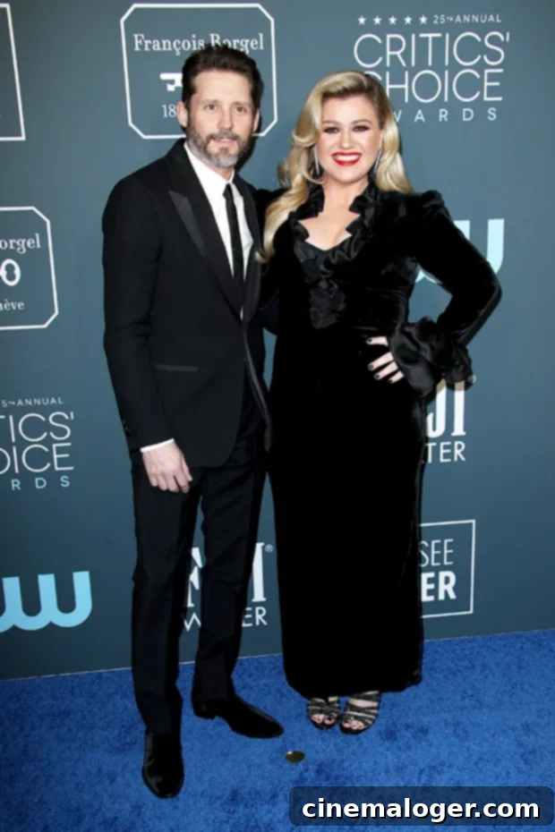Kelly Clarkson Quips She'll Be 'Single Forever' After Brandon Blackstock Divorce 2 Kelly Clarkson and Brandon Blackstock's Divorce Journey
