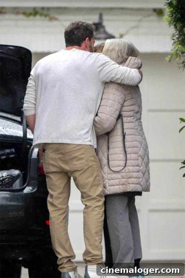 Ben Affleck and Daughter Violet Bid Sweet Farewell to Grandma 3 Ben Affleck hugging his mother Chris Anne Boldt as she departs.