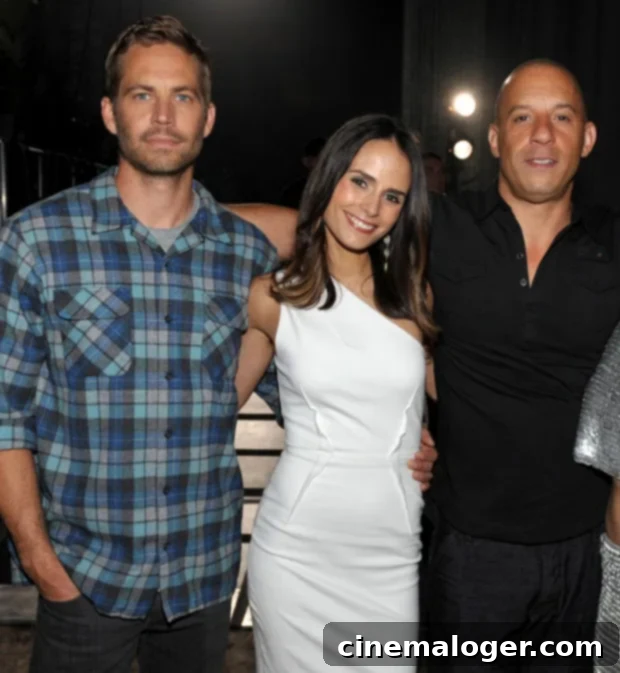 Jordana Brewster with Vin Diesel and the late Paul Walker, symbolizing the enduring Fast & Furious family bond and shared history.