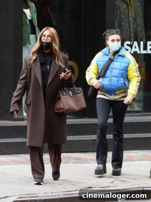David Bowie's Daughter Lexi, 21, Joins Radiant Makeup-Free Iman for Rare Outing 2 Lexi and Iman bundled up for a day in New York!