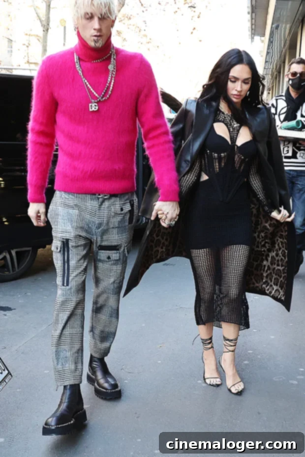 Megan Fox and Machine Gun Kellys First Appearance Since The 400K Engagement 3 Megan Fox and Machine Gun Kelly glowing during their post-engagement walk in Milan.