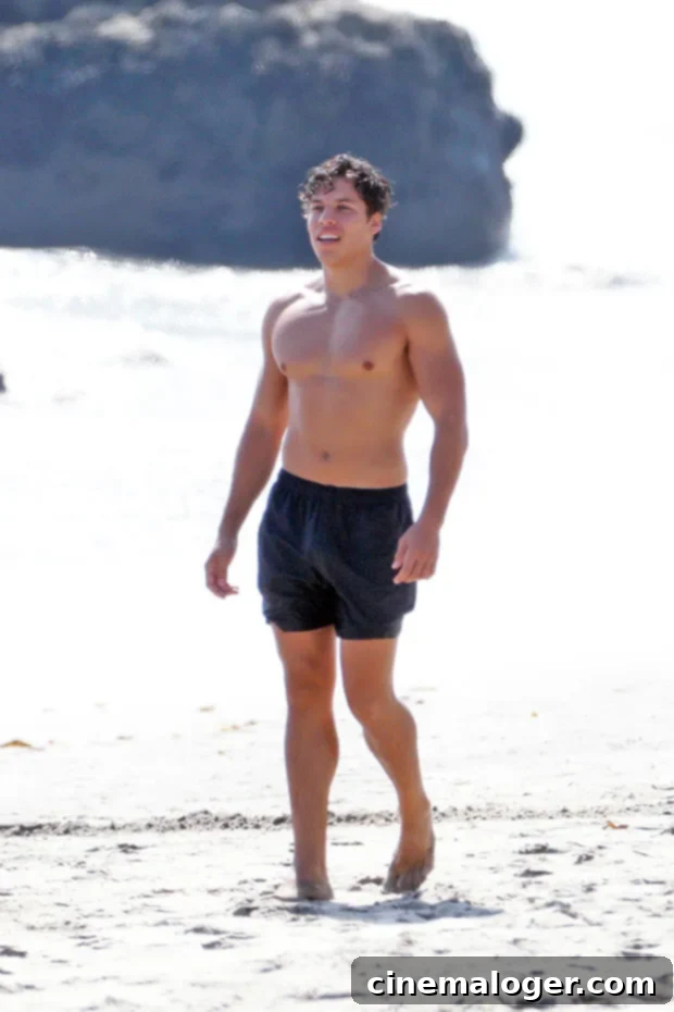 Joseph Baena Embodies Arnold Schwarzenegger With Shirtless Beach Pose 2 Joseph Baena
