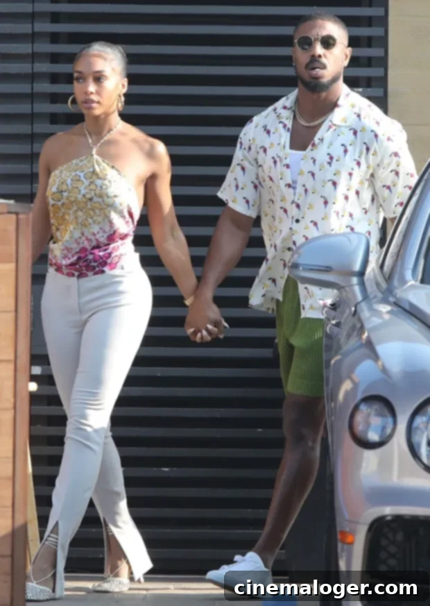Steve Harvey's Verdict on Michael B. Jordan Marrying Lori Harvey 2 Lori Harvey and Michael B. Jordan embrace lovingly in a public setting.
