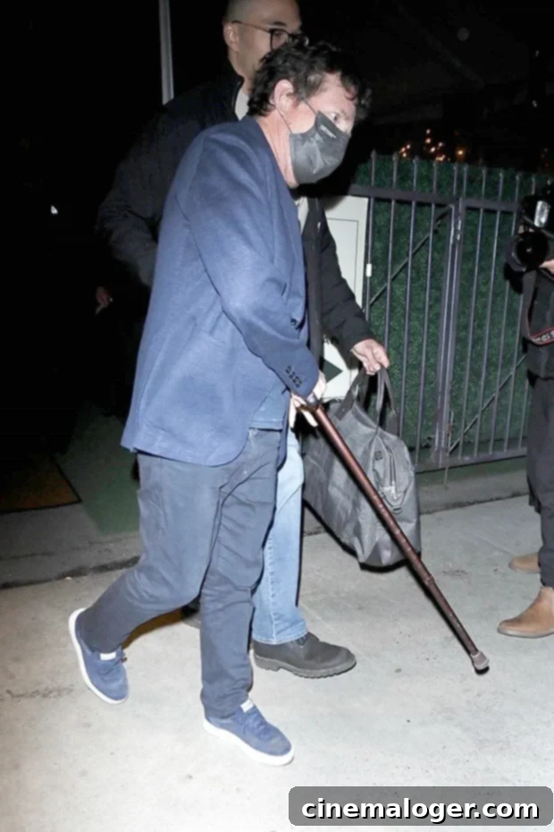Michael J. Fox, 60, Leans on Cane During Rare Outing as Parkinson's Fight Continues 2 Michael J. Fox
