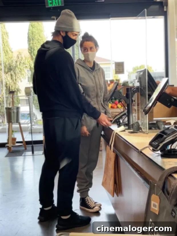 Shailene Woodley and Aaron Rodgers: Rekindling Their Engagement 2 Shailene Woodley and Aaron Rodgers paying for groceries