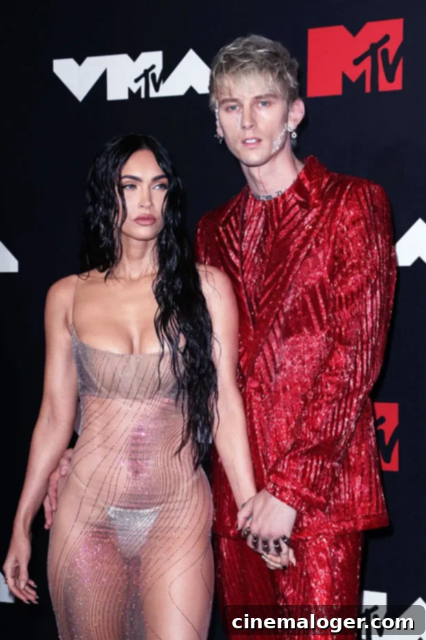 Machine Gun Kelly Believes Megan Fox Is Too Good For Him On Twin Flame 2 Megan Fox and Machine Gun Kelly in an intimate pose.