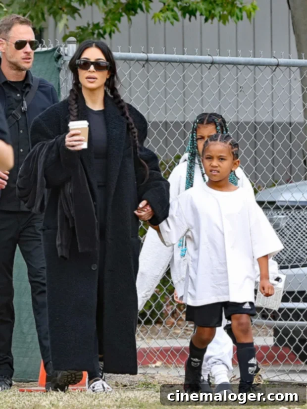 Kim Kardashian's Pitchside Love: Cuddles for North & Chicago, Cheers for Saint 2 kim kardashian kids