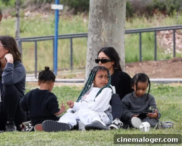 Kim Kardashian's Pitchside Love: Cuddles for North & Chicago, Cheers for Saint 3 kim kardashian kids