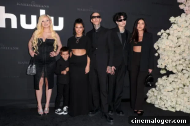 Scott Disick: An Outsider at The Kardashians Premiere 3 Kourtney Kardashian and Travis Barker with their blended family, including her son Reign with Scott, and his kids Alabama, Landon and Atiana.