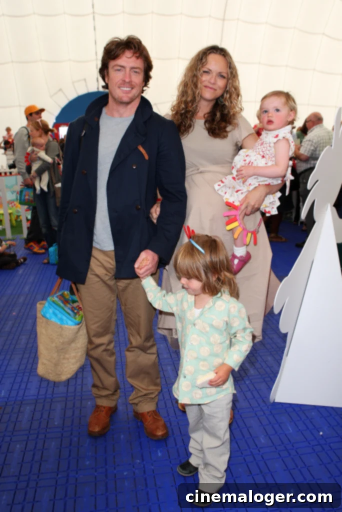 Dame Maggie Smith's Five Grandchildren: A Family Portrait 3 LONDON, ENGLAND - AUGUST 15:  (EXCLUSIVE ACCESS) Actors and husband and wife Toby Stephens and Anna-Louise Plowman and their children Eli and Tallulah attend 'In The Night Garden ... Live' in the Meridian Gardens at The O2 on August 15, 2010 in London, England.  (Photo by Jon Furniss/WireImage)