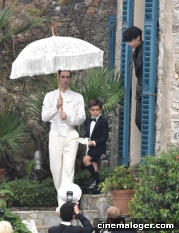 Reign Disick Steals The Spotlight As Kourtney Kardashian Wedding Ring Bearer 2 Reign Disick, Kourtney Kardashian's son, as ring bearer at her wedding to Travis Barker in Italy.