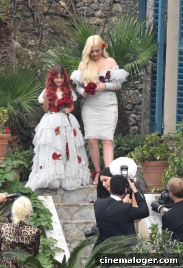 Reign Disick Steals The Spotlight As Kourtney Kardashian Wedding Ring Bearer 3 Alabama Barker and Penelope Disick looking elegant at Kourtney and Travis's wedding.