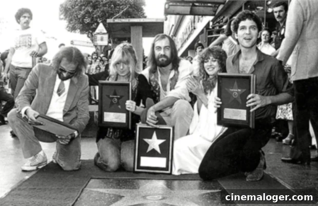 Stevie Nicks and Lindsey Buckingham: The Enduring Partnership On and Off Stage 4 Fleetwood Mac members standing together on the Hollywood Walk of Fame.
