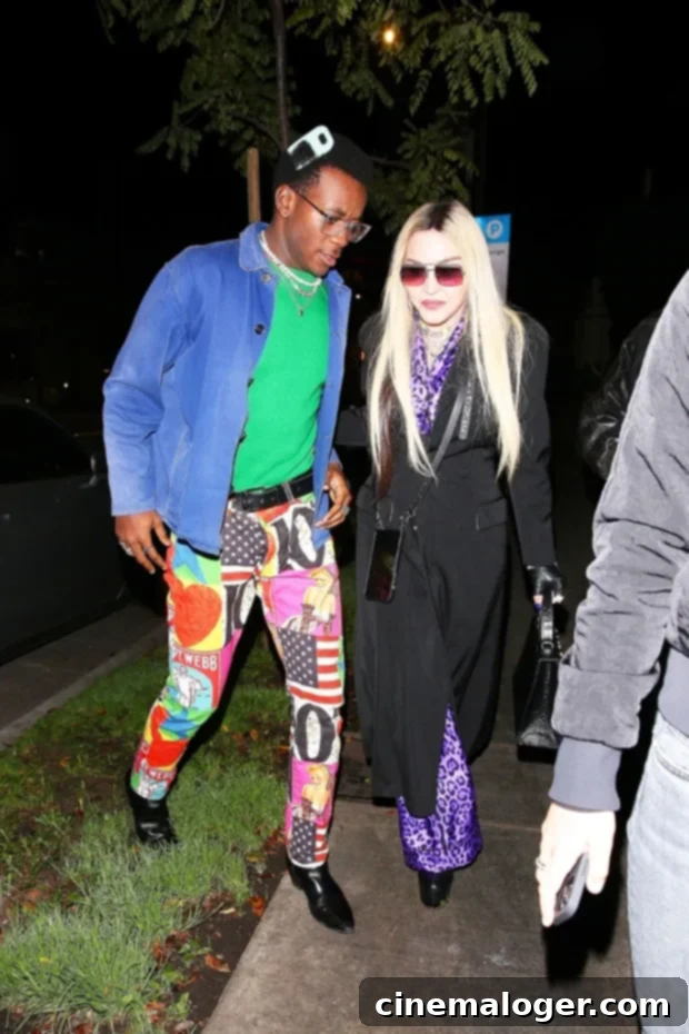 Madonna's Son David Banda, 16, Rocks a Dress at Boxing Match 2 David Banda & Madonna