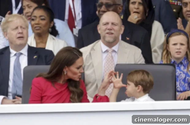 Prince Louis Delivers Hilarious Face For Mom Kate At Platinum Jubilee Pageant 2 Kate Middleton attempts to soothe a playful Prince Louis during the Platinum Jubilee celebrations at Buckingham Palace.