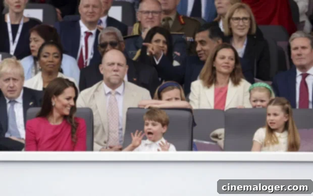 Prince Louis Delivers Hilarious Face For Mom Kate At Platinum Jubilee Pageant 3 Kate Middleton smiles as her children, including Prince Louis, observe the Platinum Jubilee Pageant with keen interest.