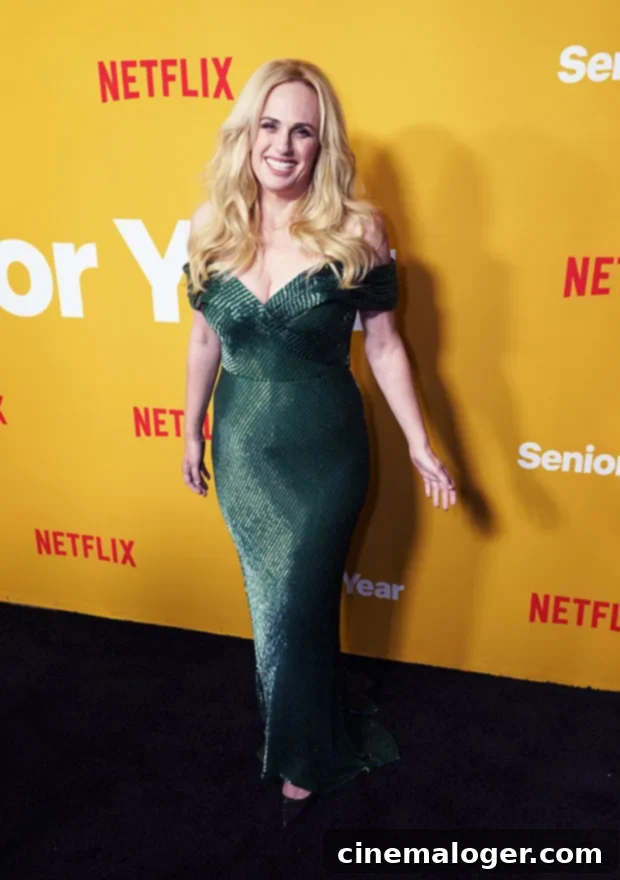 Rebel Wilson Wows In High-Waisted Bikini Following Girlfriend Reveal 2 Rebel Wilson Posing with a Serious Expression