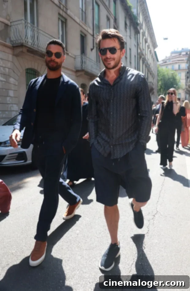 Bridgerton Heartthrobs Rege-Jean Page and Jonathan Bailey Reunite for Armani 2 Rege-Jean Page and Jonathan Bailey share a laugh at the Giorgio Armani fashion show in Milan.