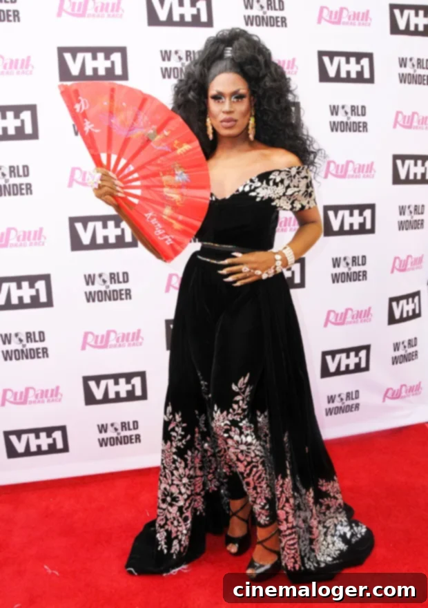 Shea Coulée's Pride Finale: Boosting Your Confidence for 2022 3 Shea Coulée in a glamorous outfit.