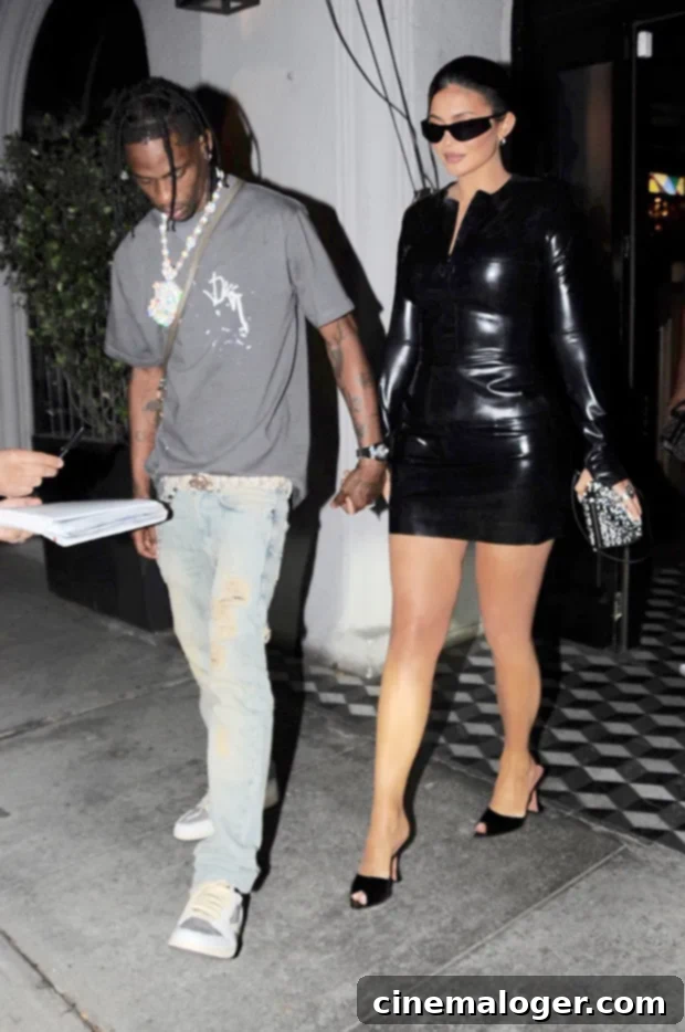 Kylie Jenner Channels 'The Matrix' in PVC Minidress for Travis Scott Date 2 Kylie Jenner in black PVC dress and Versace sunglasses