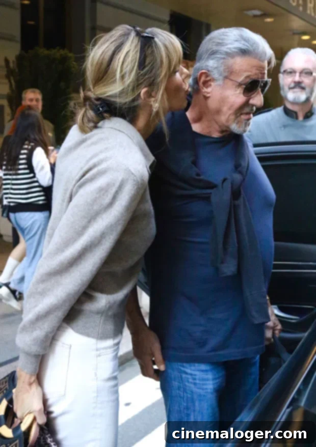 Jennifer Flavin kisses Sylvester Stallone after reconciling