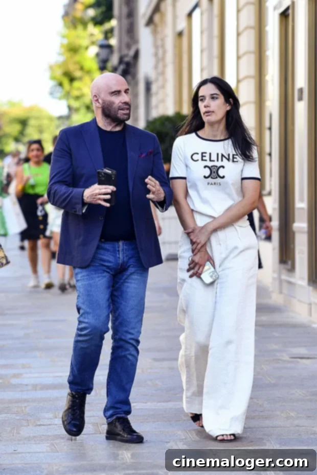 Parisian Stroll: Ella Travolta, 22, Closing In On Dad John's Height 2 John & Ella Travolta