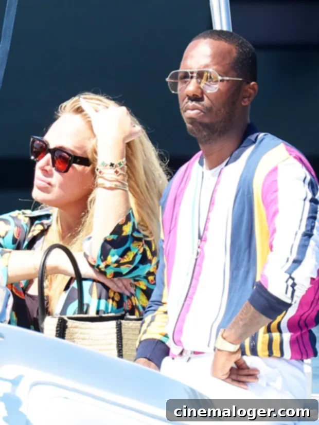 Adele Rocks Vibrant Beach Look in Sardinia Alongside Rich Paul 2 Adele and Rich Paul on a boat in Sardinia