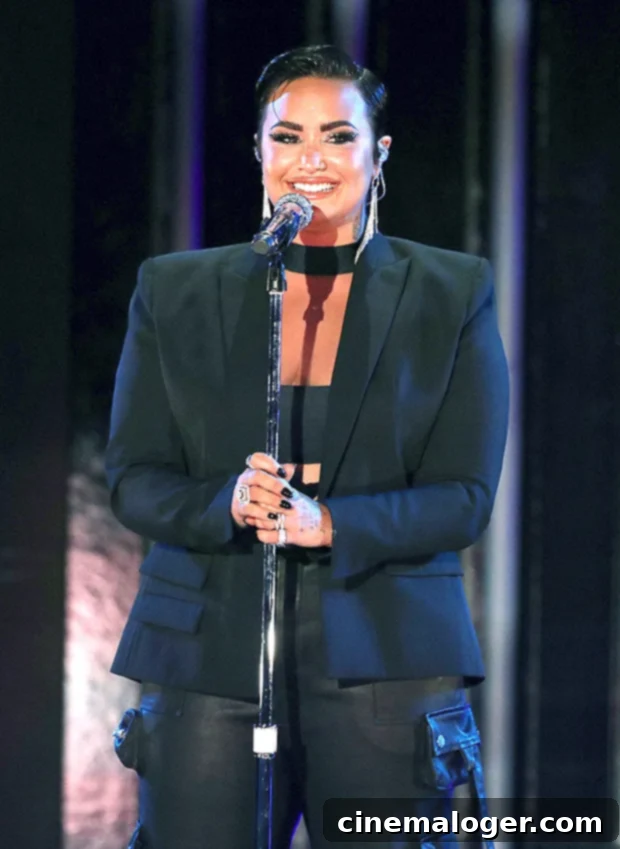 Demi Lovato Enjoys A Happy And Healthy Relationship With Her Musician Partner 2 Demi Lovato smiles, possibly with her new musician boyfriend, amidst a new era of love and music.