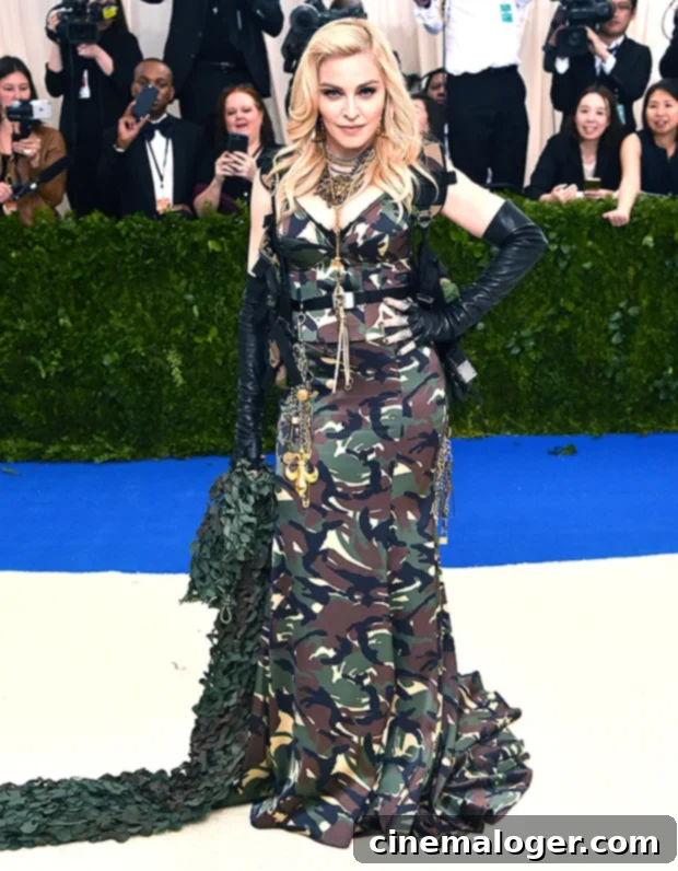 Madonna Celebrates 64 in Daring Lowcut Dress and Fishnets 2 Madonna