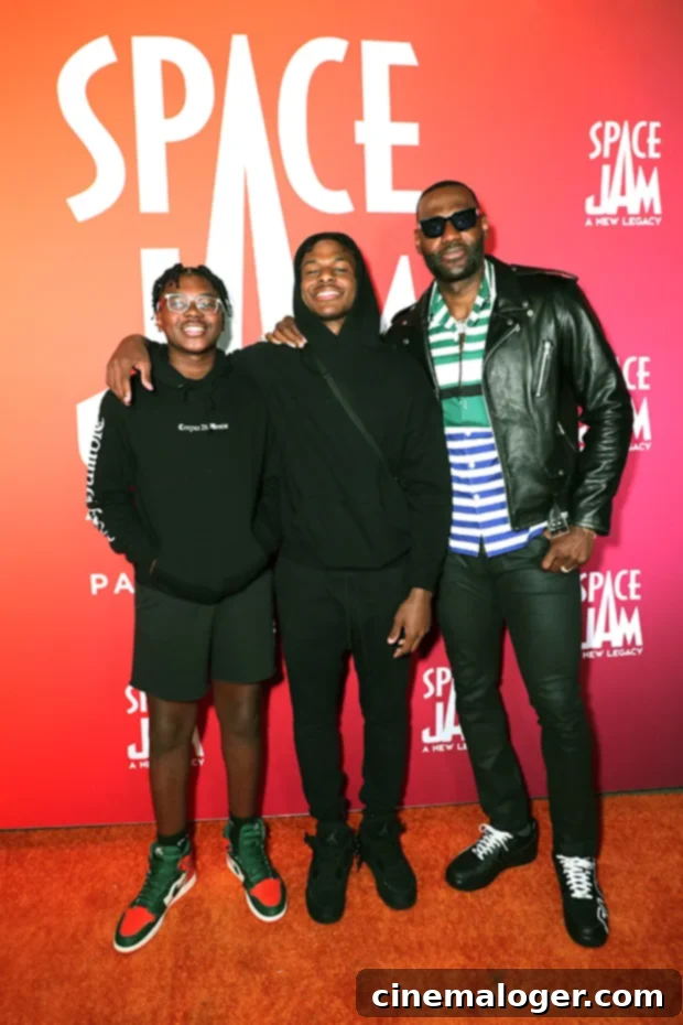 LeBron James Hopes To Share NBA Court With Sons 2 LeBron James smiling with his sons Bronny and Bryce at the Space Jam 2 premiere event.