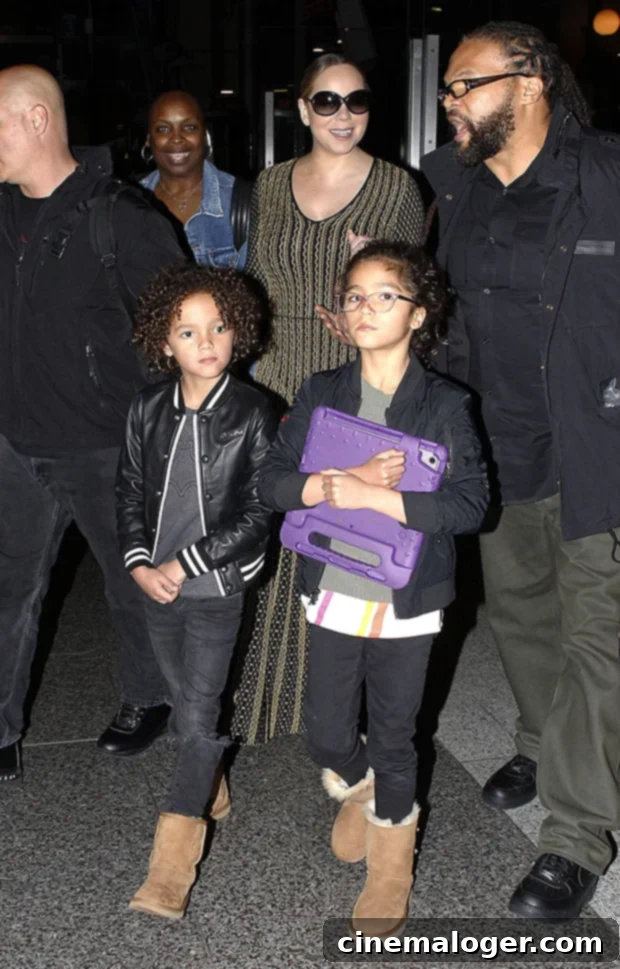 Mariah's Fun Day with Twins Moroccan and Monroe, 11, at Amusement Park as Nick Cannon Prepares for His Next Child 2 Mariah Carey with twins Moroccan and Monroe