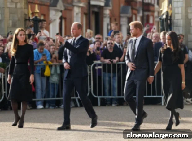 First Photos: Harry and Meghan Reunite with William and Kate to Mourn Queen 3 The foursome waved at onlookers while viewing the tributes to the late Queen.