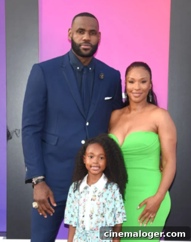 LeBron and Savannah James Unveil Glam Family Photos From Their LA Home 3 LeBron, Savannah, and Zhuri James in a family moment