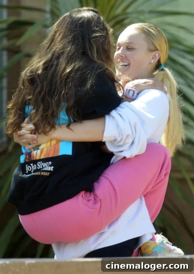 JoJo Siwa & Avery Cyrus Flaunt Romance With First Public Kisses 3 JoJo Siwa and Avery Cyrus