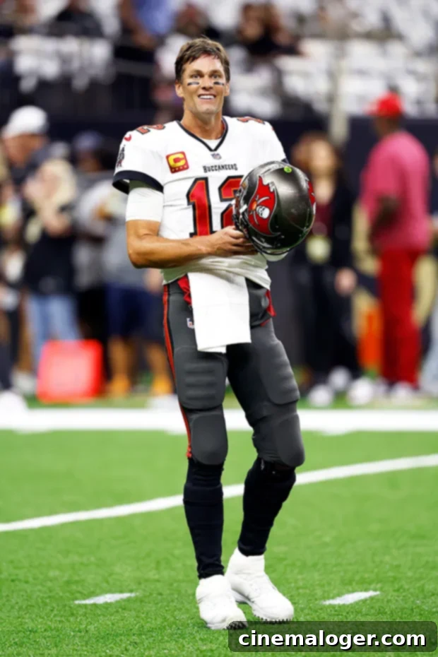 Tom Brady throwing a tablet in frustration during a game