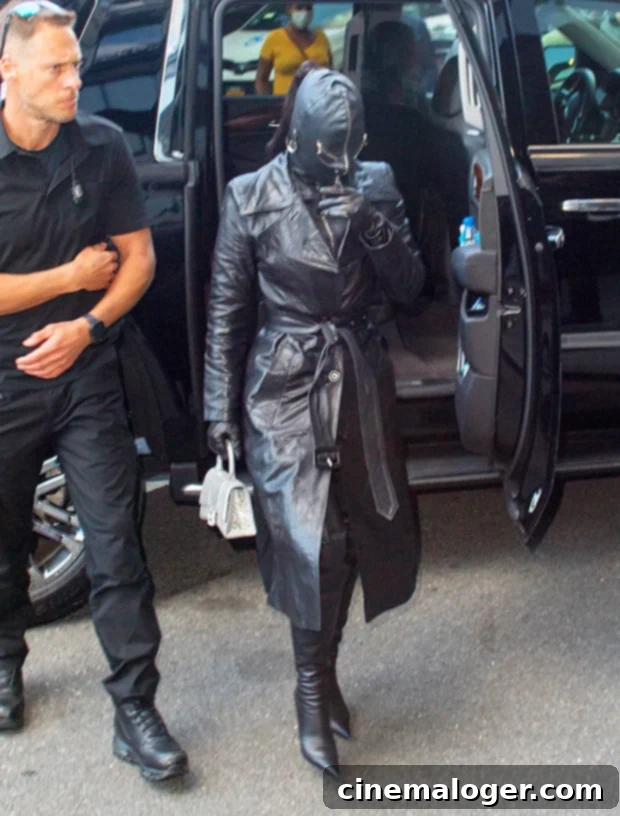 North West Adopts Kanye's Signature Masked Look In Paris 4 Kim Kardashian