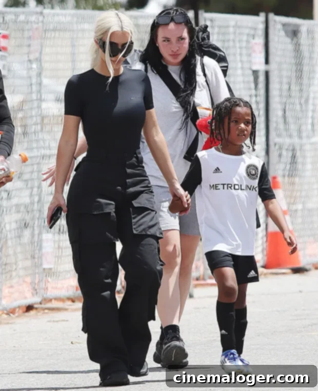 Kim Kardashian Plays Dedicated Mom At Saint's Soccer Match, Unbothered By Kanye's Latest Outbursts 3 Kim K