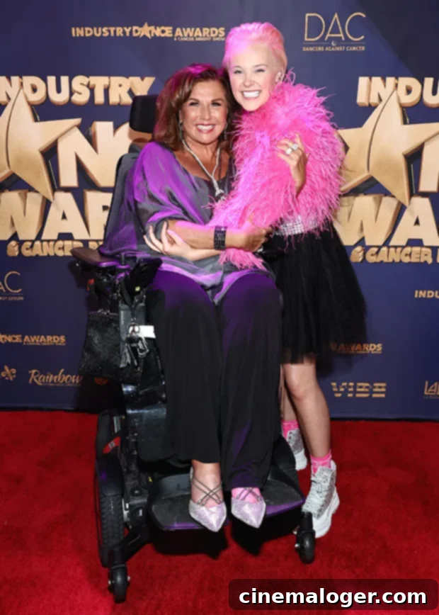 Pink-Haired JoJo Siwa Reunites with Abby Lee Miller 4 Abby Lee Miller and JoJo Siwa hugging at Industry Dance Awards