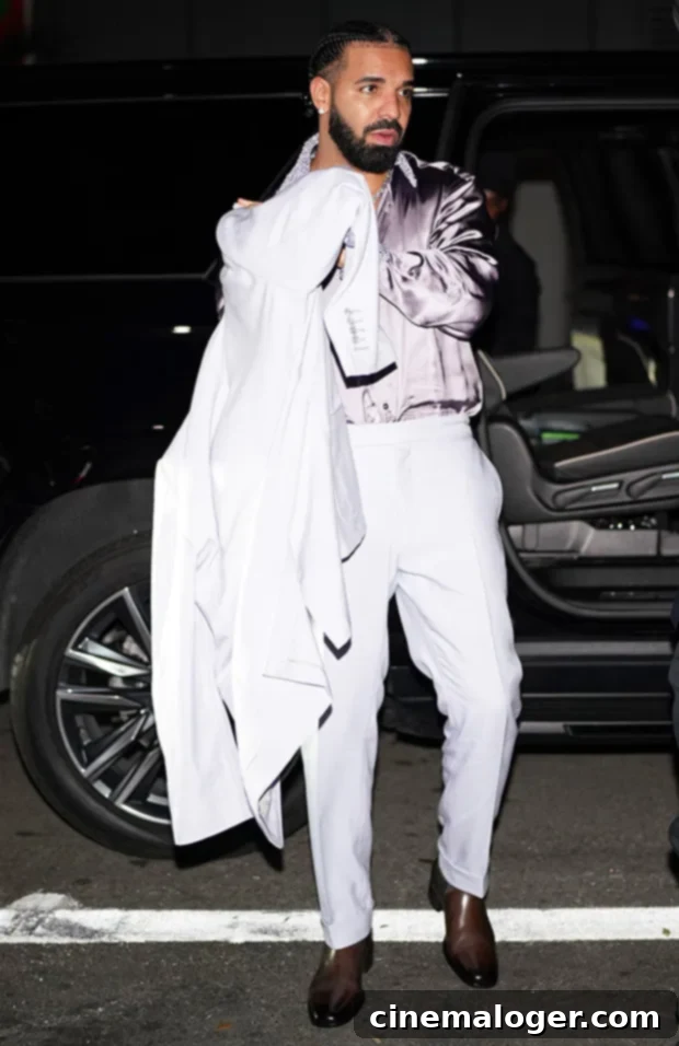 Kanye's Ex Chaney Jones Makes a Splash at Drake's 36th Birthday in Daring Jumpsuit 3 Drake enjoying his 36th birthday celebration in Miami