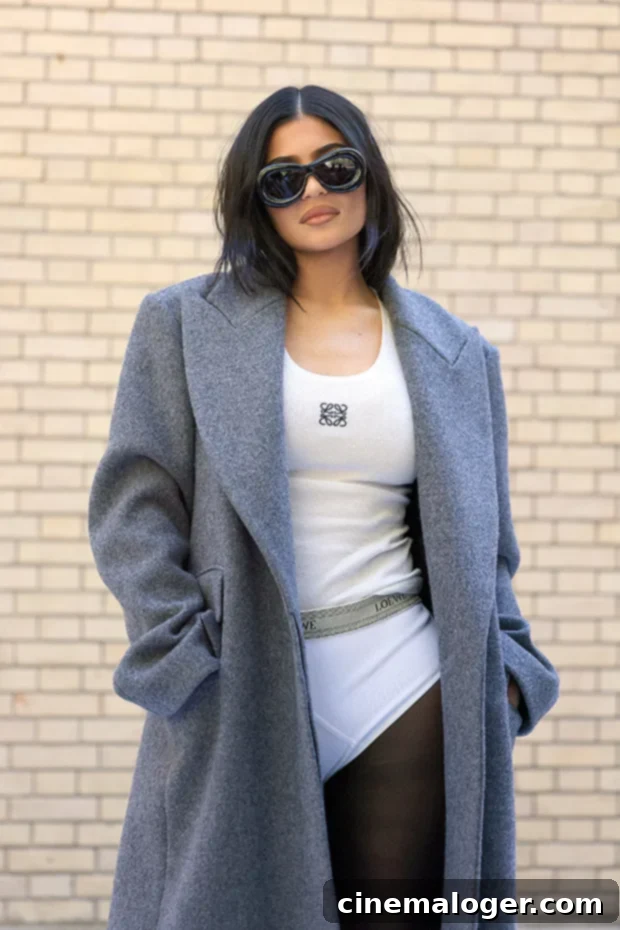 Kylie Jenner Slays In White Crop Top & Leather Jacket While Travis Scott Cheating Rumors Swirl 2 Kylie Jenner crop top