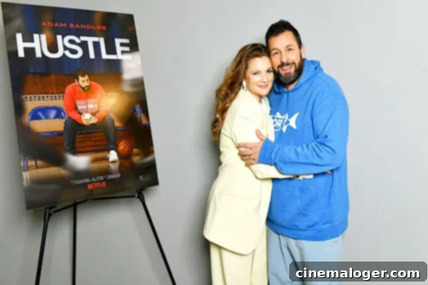 Drew Barrymore and Adam Sandler Share Sweet Reunion Hug 24 Years After Their First Film 2 Adam Sandler and Drew Barrymore share a warm moment at the 'Hustle' screening event.