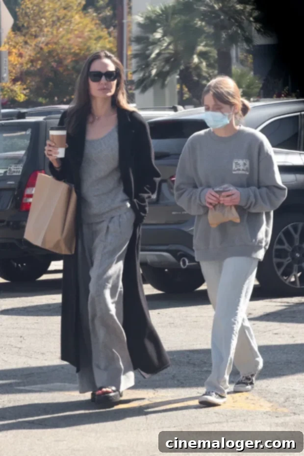 Vivienne Jolie Pitt, 14, Defines Casual Chic in Baggy Jeans and Converse for Grocery Run with Angelina 2 Angelina Jolie, Vivienne Jolie-Pitt grocery shopping