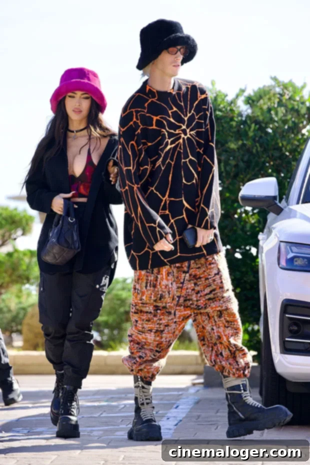 Megan Fox and Machine Gun Kelly Twin in Furry Bucket Hats for LA Lunch 2 Machine Gun Kelly and Megan Fox step out for a lunch date in West Hollywood.