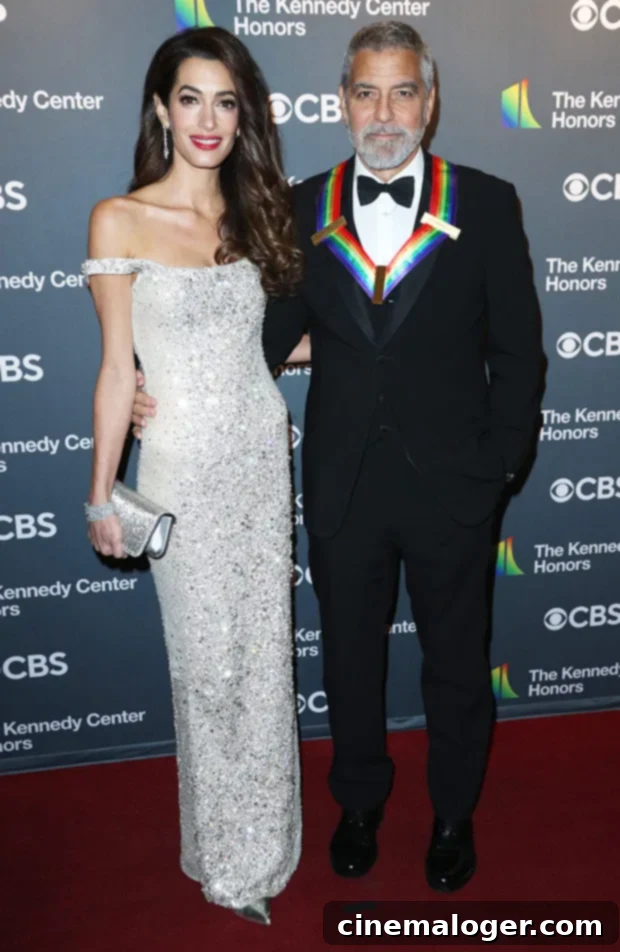 Amal Clooney Dazzles in Silver at Kennedy Center Honors 2 Amal Clooney, George Clooney arrive at the Kennedy Center Honors