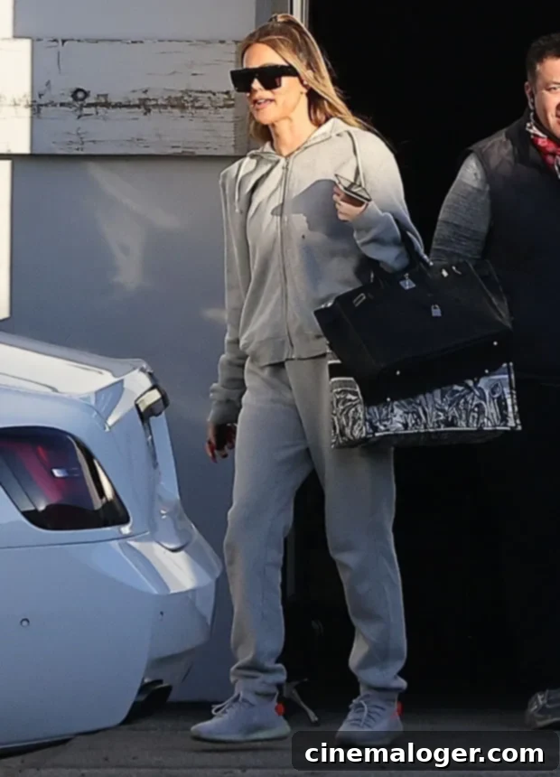 Sweatpants And Controversy: Khloe Kardashian's Latest Errand Look 2 Khloe Kardashian in Yeezy sneakers