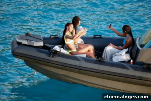 Diddy's 16-Year-Old Twins Live It Up in St Barts: Yacht Day Selfies & Tubing Thrills 2 D'Lila and Jessie Combs taking selfies on a yacht in St. Barts
